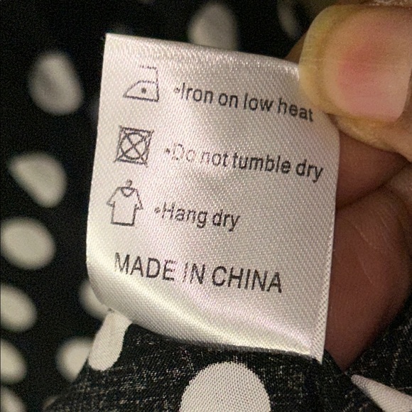 Black and White Sleeveless Maxi Dress with Ruffle Hem and V-Neckline - Picture 12 of 12